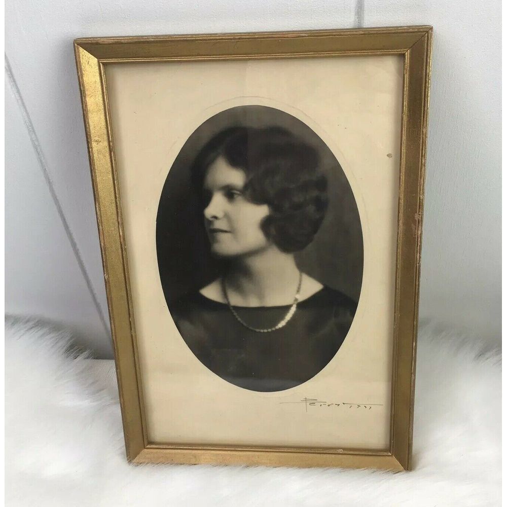Black & White Antique Portrait Photograph of Woman wearing finger wave hairstyle